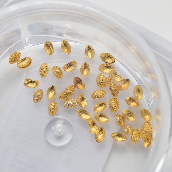 Komilfo Metal Rivets oval small 1 * 2 mm, gold Komilfo Metal Rivets oval small 1 * 2 mm, gold