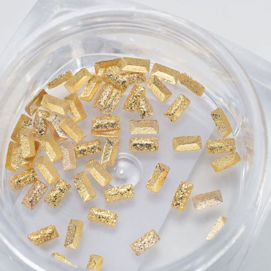Komilfo Metal Rivets rectangle small 1.5 * 3 mm, gold Komilfo Metal Rivets rectangle small 1.5 * 3 mm, gold