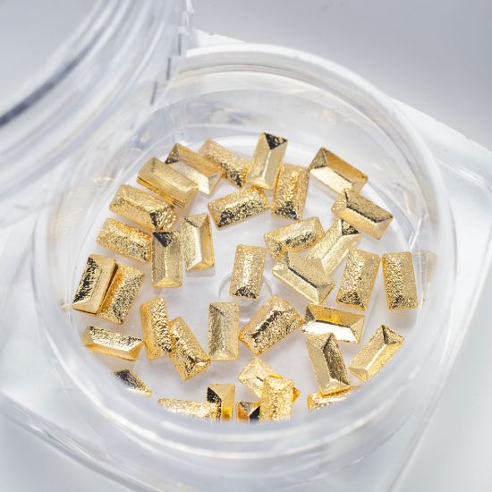 Komilfo Metal Rivets rectangle large 2 * 4 mm, gold Komilfo Metal Rivets rectangle large 2 * 4 mm, gold